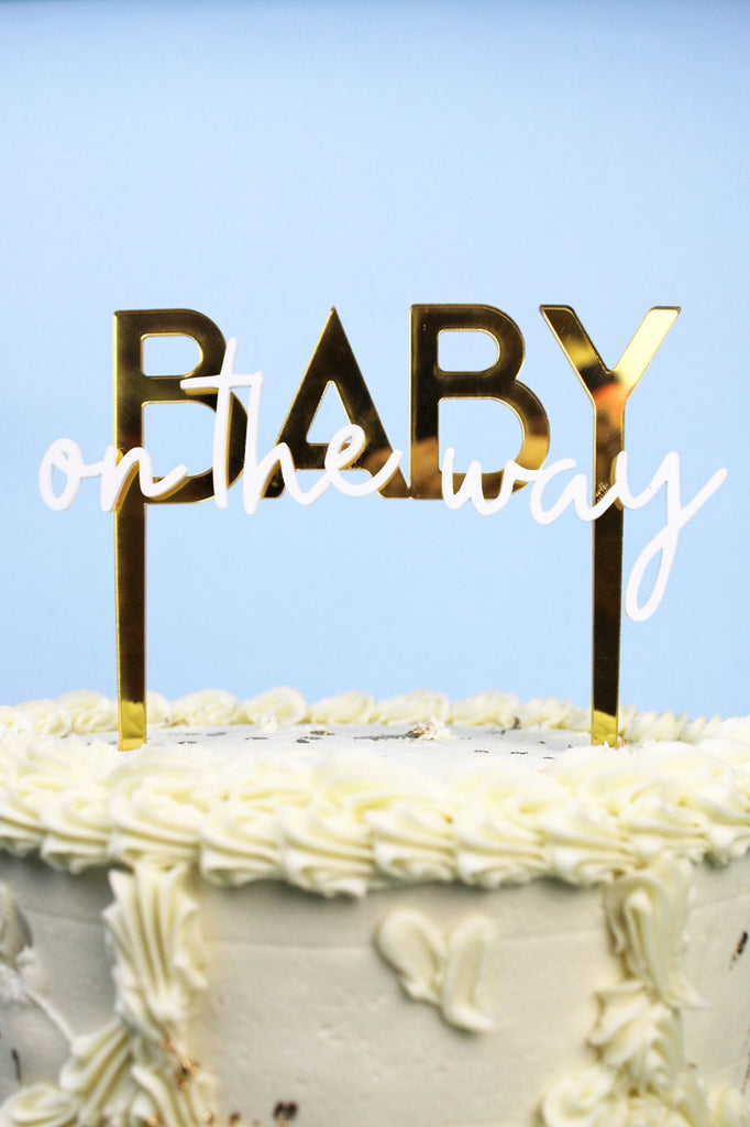 Cake topper "Baby on the way" oro/blanco